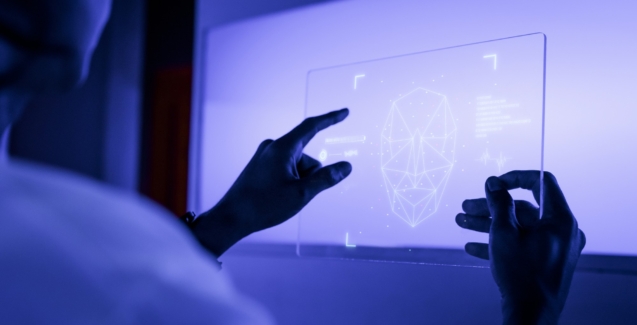designer-using-transparent-digital-tablet-screen-futuristic-technology